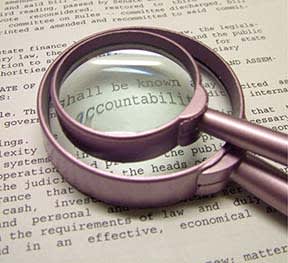 magnifying glass looking at words